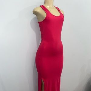 Hot pink dress with a cut at bottom